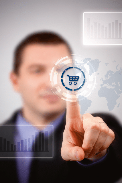 Young businessman choosing shopping cart symbol