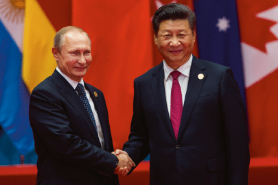 HANGZHOU, CHINA - SEPT. 4. 2016 - Chinese president Xi Jinping (R) welcomes Russian President Vladimir Putin (L) in G20 summit in Hangzhou.