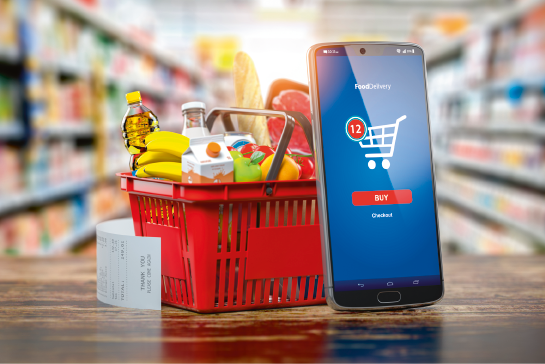 Shopping basket with fresh food and smartphone. Grocery supermarket, food and eats online buying and delivery concept. 3d illustration